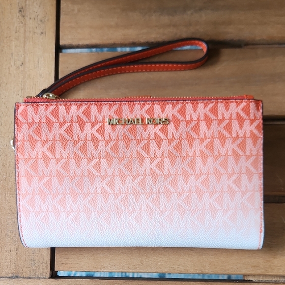 Michael Kors Orange and White Wristlet with MK Monogram - Picture 1 of 4